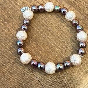 Elegant Silver and Cream Beaded Bracelet